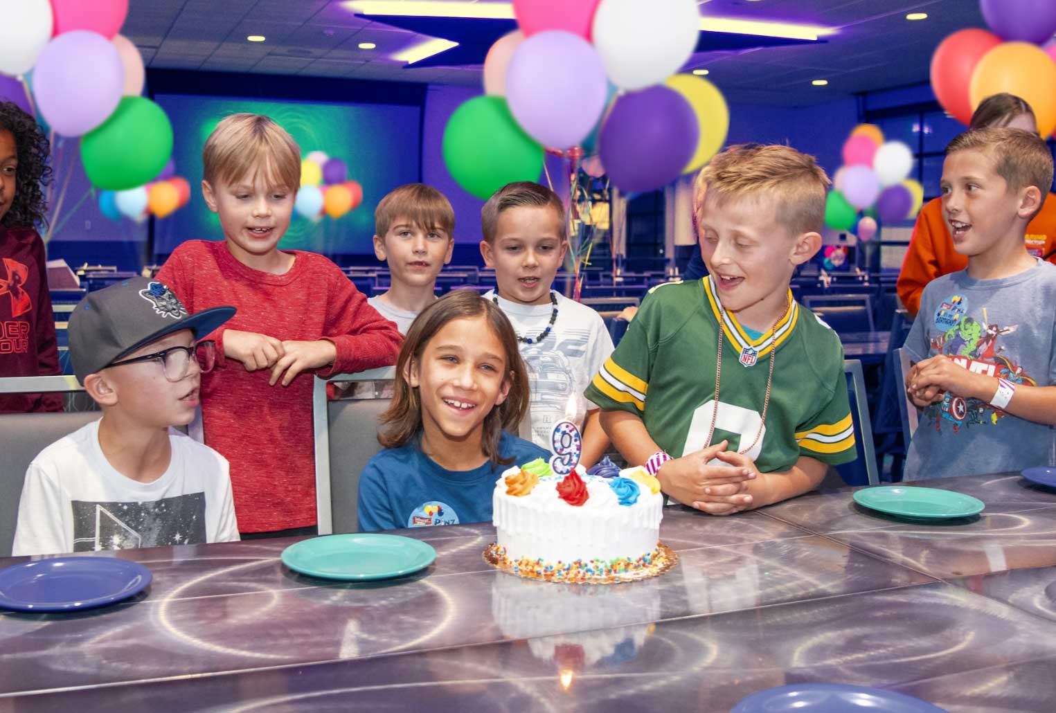 Kids-at-Table-with-Cake-2 Birthday Packages