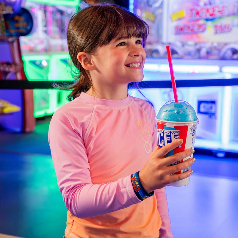 girl-with-wristband-holding-icee Tap 'n Play Wristbands at Wahooz